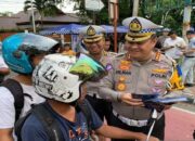 Kampanyekan Keselamatan Berlalu Lintas, Ditlantas Polda Sumbar Bagi Helm dan Sediakan Montir Gratis