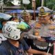 Dirlantas Polda Sumbar Kombes Pol Hilman Wijaya memberikan informasi kepada pengendara. (Foto: Istimewa)
