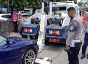 Nekat Parkir di Depan Basko Grand Mall, Dua Kendaraan Diderek Petugas
