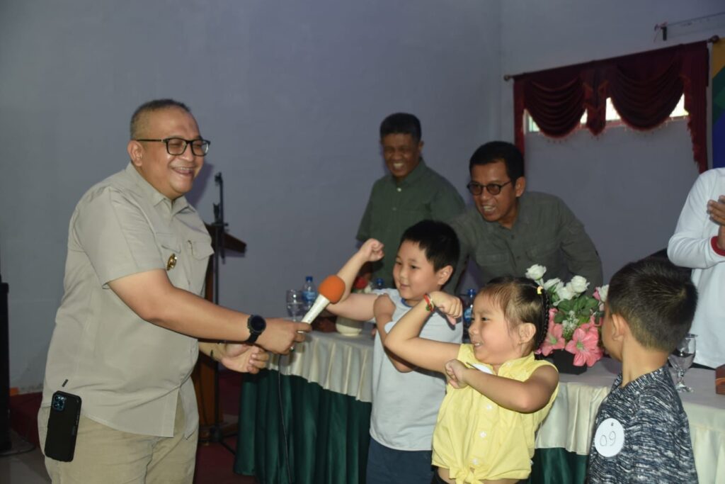 Pj Wako Padang, Andree Harmadi Algamar membuka kegiatan seni dan olahraga lintas agama, Sabtu (31/8/2024) siang. (Foto: Dok. Prokopim)