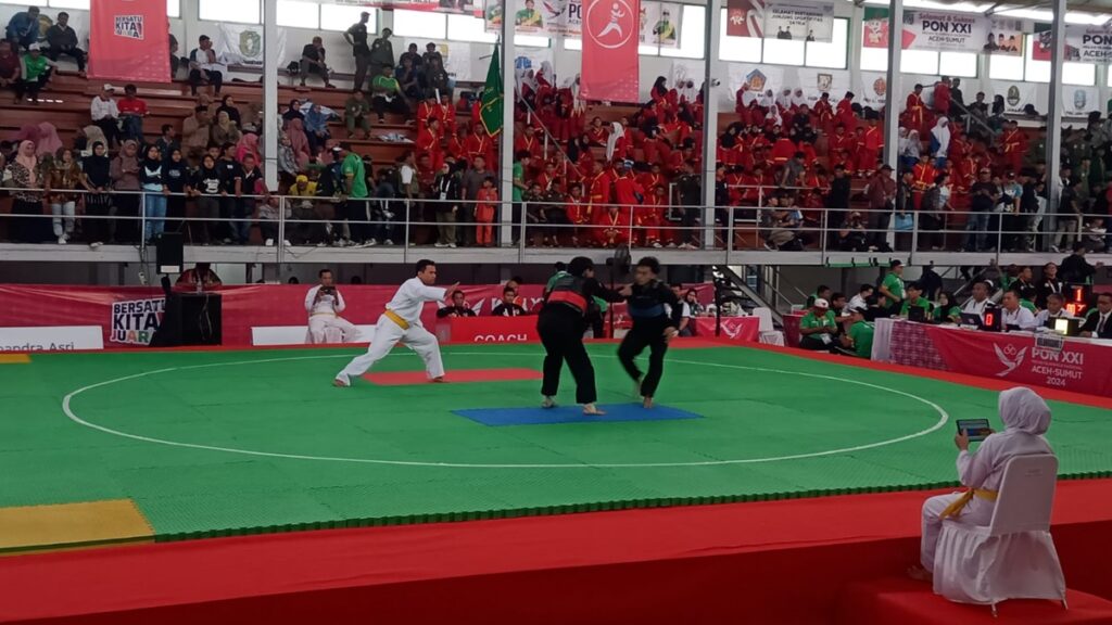 Pesilat Sumbar M. Iqbal kalah di babak perempat final PON XXI Aceh-Sumut. (dok. istimewa)