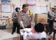 Polres Pasaman Barat Bagikan Ratusan Paket Makanan Bergizi Gratis untuk Murid SD