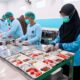 Proses packing program makan bergizi gratis yang dicanangkan Presiden Prabowo. (dok. PCO RI)