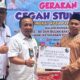 Semen Padang serahkan bantuan 100 sak semen di Padang Pariaman. (dok. Humas)