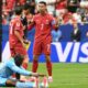 Cristiano Ronaldo memprotes keputusan wasit saat laga kontra Kongo. (AFP)