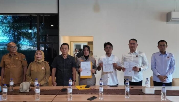 Kombes Pol. Teddy Fanani dan Bill Irzano Tandatangani Kesepakatan Damai